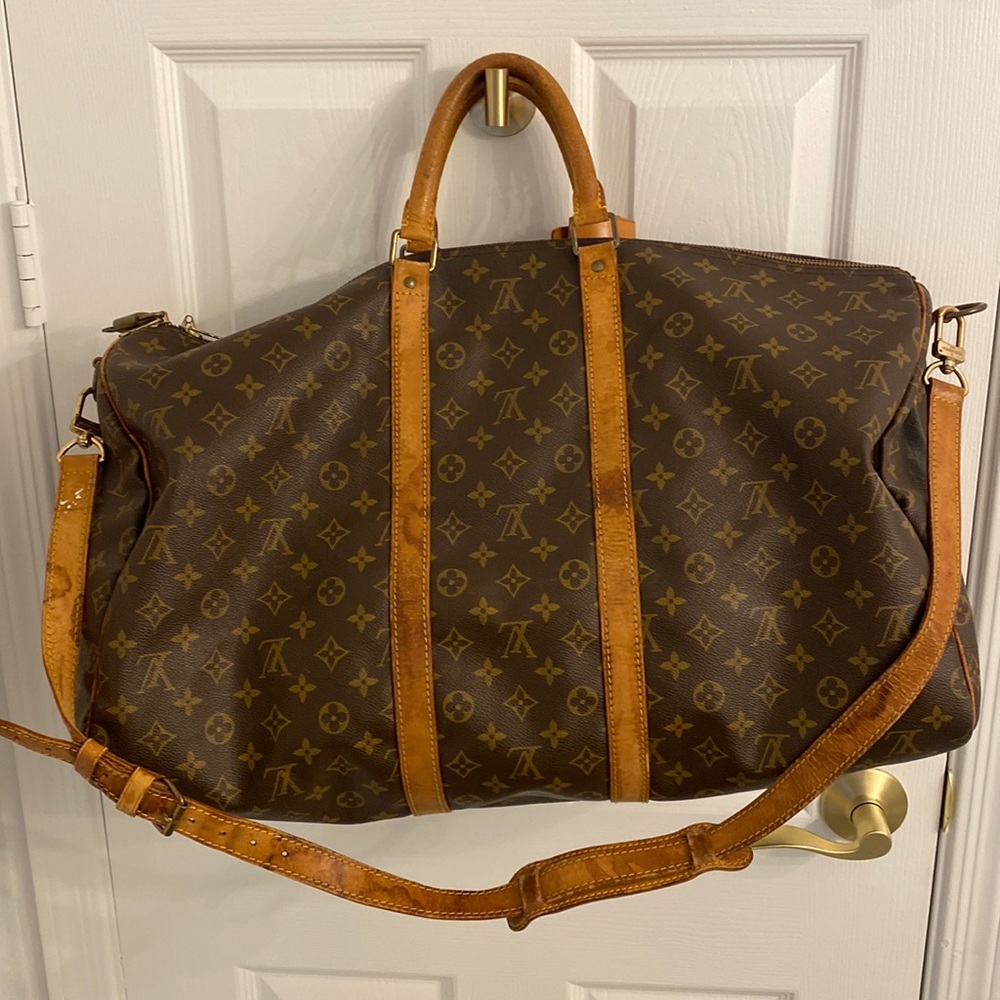 Louis Vuitton Vintage Monogram Keepall Bandouliere
55” Traveling Duffle Bag.